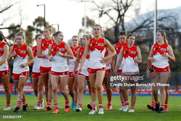 The Swans leave the field after a loss during the 2022 S7 AFLW Round 06 match between the North Melbourne Kangaroos and the Sydney Swans at Swinburne...