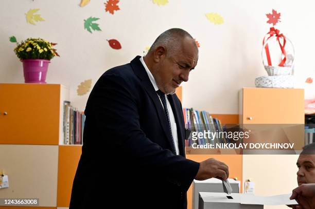 The head of the GERB party and former prime minister Boyko Borisov casts his ballot at a polling station during the country's parliamentary elections...