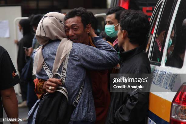 Man cries knowing that his family members were victims of a riot at a soccer match at a public hospital, in Malang, East Java, on October 2, 2022. At...