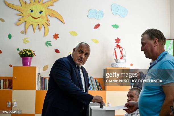 The head of GERB party and former Bulgaria's prime minister Boyko Borisov casts his ballot at a polling station during the country's parliamentary...
