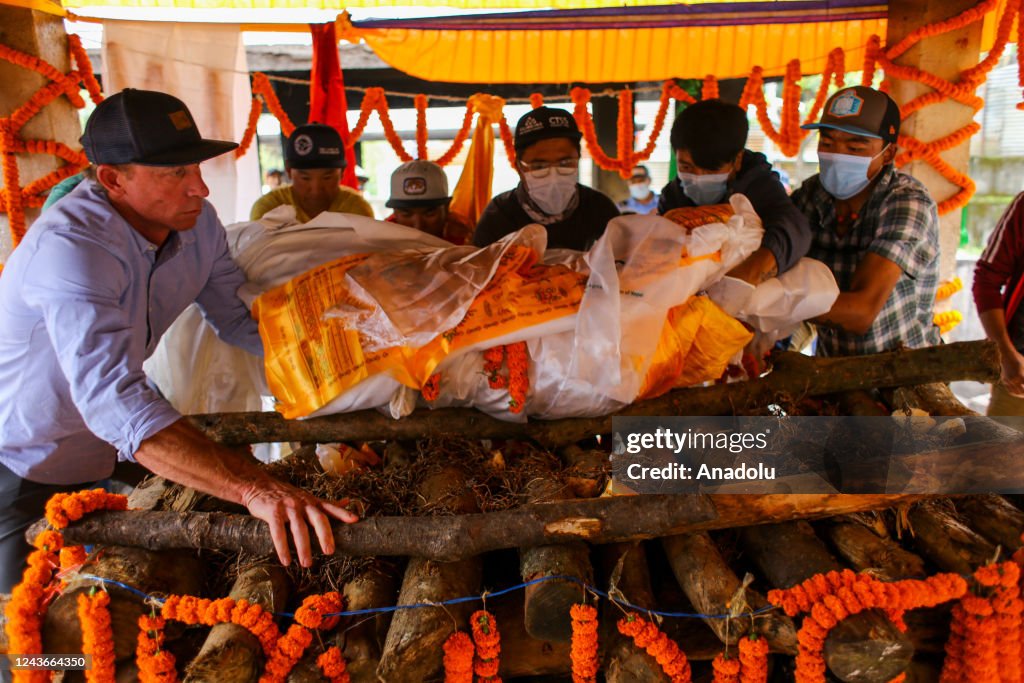 Skier Ritual Friends and family members perform ritual during the funeral of famed ...