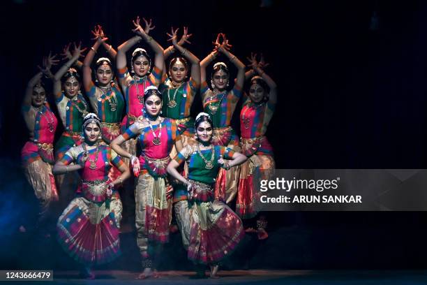 In this photograph taken on October 1 artists perform a dance drama 'Praise of Seven Hills' during the celebrations to mark the Hindu festival of...