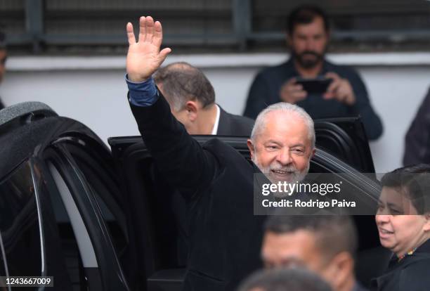 Former President of Brazil and Candidate for the Worker's Party Luiz Inacio Lula da Silva waves to supporters during general elections day on October...