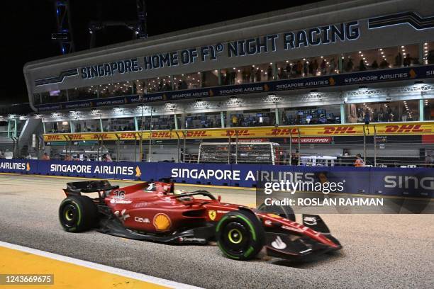 Ferrari's Monegasque driver Charles Leclerc drives during the Formula One Singapore Grand Prix night race at the Marina Bay Street Circuit in...