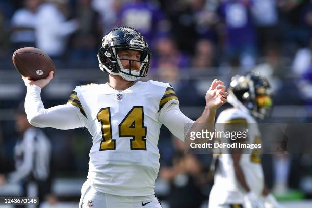 Andy Dalton of New Orleans Saints controls the ball prior to the NFL match between Minnesota Vikings v New Orleans Saints at Tottenham Hotspur...
