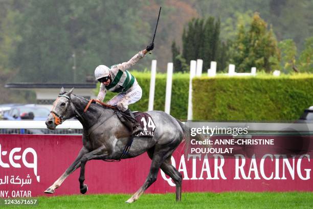 British jockey Luke Morris riding on "Alpinista" competes on his way to win The Prix de l'Arc de Triomphe horse race at The Paris Longchamp...