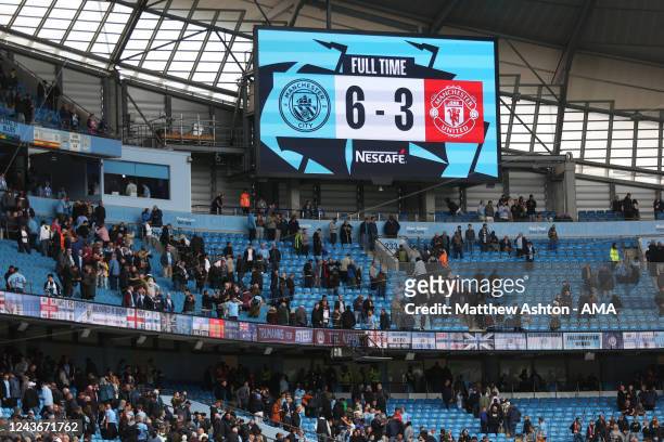 An LED screen shows the final score line during the Premier League match between Manchester City and Manchester United at Etihad Stadium on October...