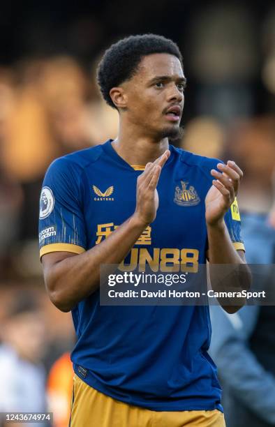 Newcastle United's Jamai Lewis applauds the fans at the final whistle during the Premier League match between Fulham FC and Newcastle United at...