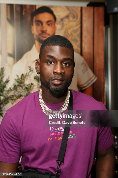 Dami Hope attends the boohooMAN X Davide exclusive launch party at Crazy Pizza on October 2, 2022 in London, England.