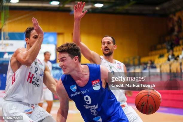 Philipp D'Angelo of Vienna and Milos Latkovic of Kapfenberg during the Basketball Superliga match between Kapfenberg Bulls and D.C. Timberwolves at...