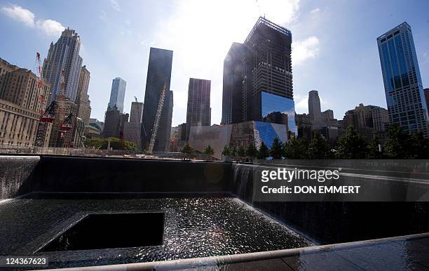 The north reflecting pool of the World trade Center Memorial on September 9, 2011 in New York. Workers and security are preparing the area for the...