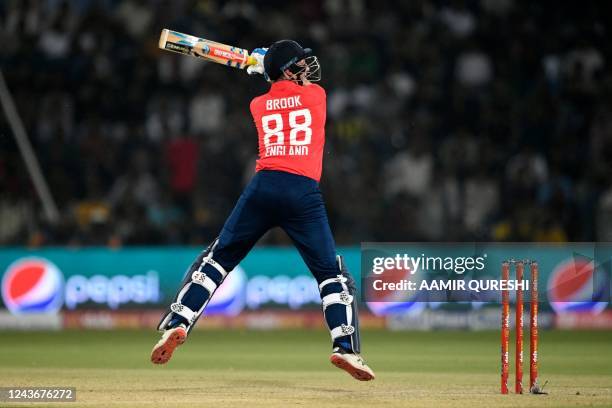 England's Harry Brook plays a shot during the seventh Twenty20 international cricket match between Pakistan and England at the Gaddafi Cricket...