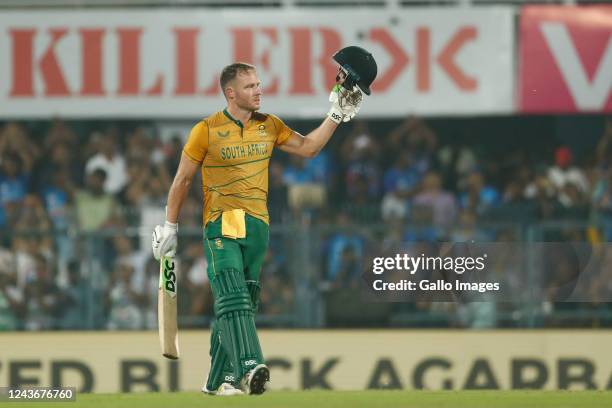 David Miller of South Africa celebrates after scoring a hundred during the 2nd T20 international match between India and South Africa at Barsapara...