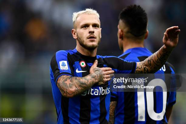Federico Dimarco of FC Internazionale celebrates after scoring the opening goal during the Serie A football match between FC Internazionale and AS...