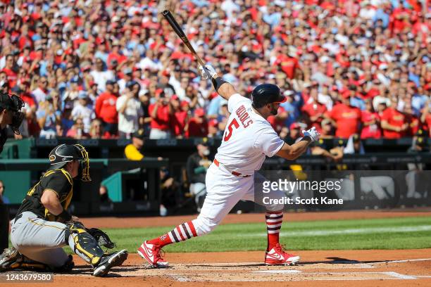 Albert Pujols of the St. Louis Cardinals hits a two-RBI double during the first inning against the Pittsburgh Pirates at Busch Stadium on October 2,...