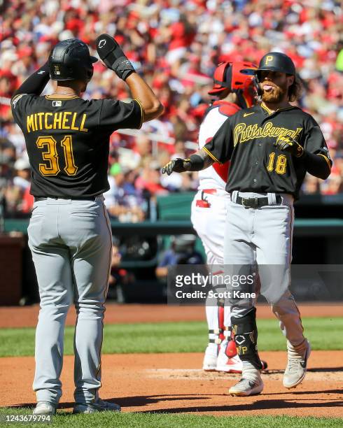Cal Mitchell of the Pittsburgh Pirates prepares to congratulate Ben Gamel after Gamel hit a three-run home run during the second inning against the...