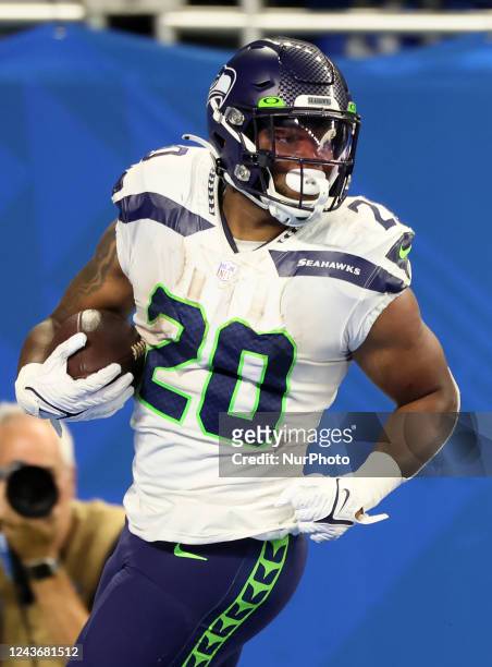 Seattle Seahawks running back Rashaad Penny runs the ball in for a touchdown during an NFL football game between the Detroit Lions and the Seattle...