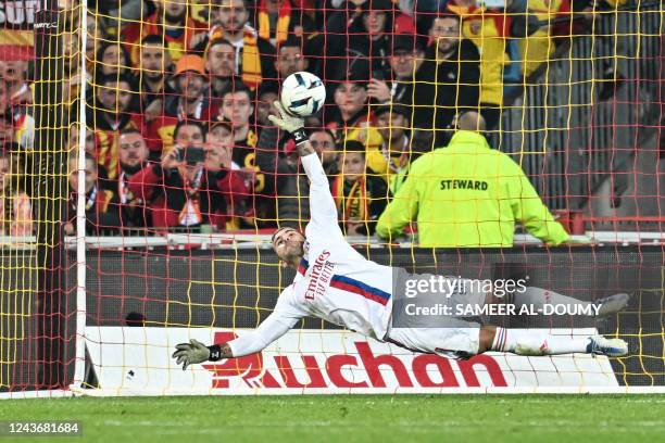 Lyon's Portuguese goalkeeper Anthony Lopes jumps and concedes a goal during the French L1 football match between RC Lens and Olympique Lyonnais at...
