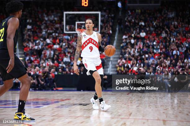 Wilson of the Toronto Raptors dribbles the ball against the Utah Jazz during a preseason game on October 2, 2022 at the Rogers Place in Edmonton,...