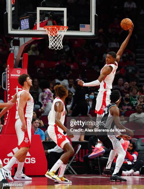 Jabari Smith Jr. #1 of the Houston Rockets grabs a rebound during the game against the San Antonio Spurs at Toyota Center on October 02, 2022 in...