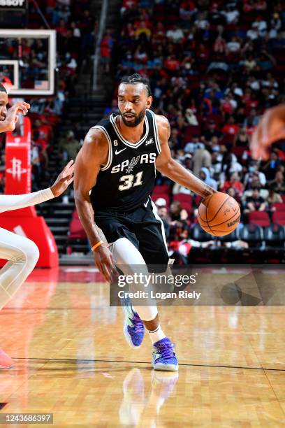 Keita Bates-Diop of the San Antonio Spurs dribbles the ball against the Houston Rockets during a preseason game on October 2, 2022 at the Toyota...