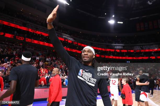 Precious Achiuwa of the Toronto Raptors waves to fans after a preseason game on October 2, 2022 at the Rogers Place in Edmonton, Alberta, Canada....