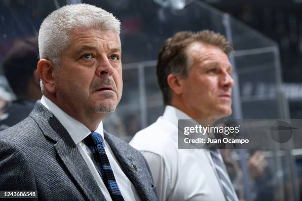 Todd McLellan Head Coach of the Los Angeles Kings looks on from the bench during warm ups prior to the game against the Anaheim Ducks at Crypto.com...
