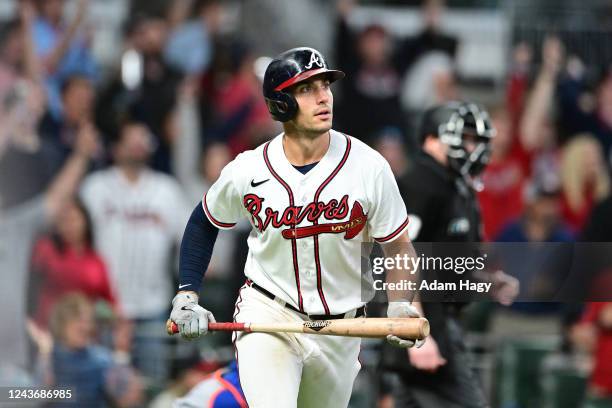 Matt Olson of the Atlanta Braves watches his home run against the New York Mets during the sixth inning at Truist Park on October 2, 2022 in Atlanta,...