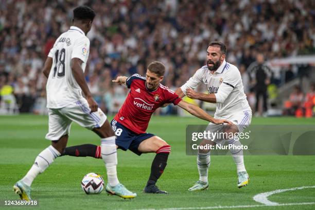 Darko Brasanac of CA Osasuna being defended by Daniel Carvajal of Real Madrid Cf during a match between Real Madrid v Osasuna as part of LaLiga in...