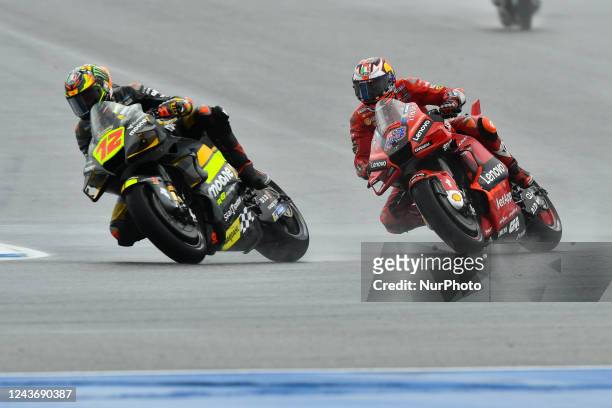 Jack Miller as Australian MotoGP racer Ducati Lenovo Team and Maverick Viñales as Spanish MotoGP racer Aprilia Racing during MotoGP race at Chang...