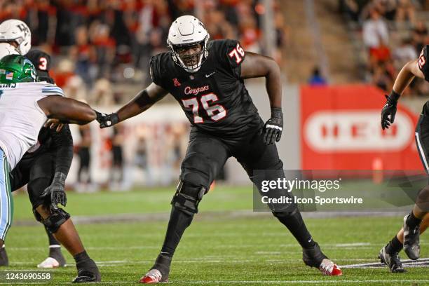 Houston Cougars offensive lineman Patrick Paul prepares to block during the football game between the Tulane Green Wave and Houston Cougars at TDECU...