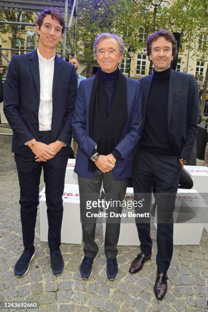 Alexandre Arnault, LVMH CEO Bernard Arnault and Antoine Arnault attend the Stella McCartney show during Paris Fashion Week Womenswear Spring/Summer...