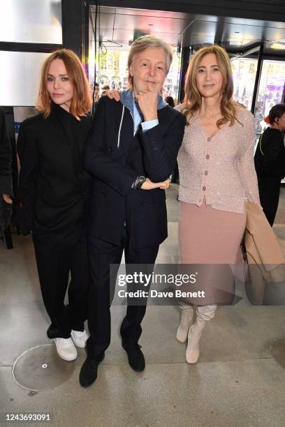 Stella McCartney, Sir Paul McCartney and Nancy Shevell pose backstage at the Stella McCartney show during Paris Fashion Week Womenswear Spring/Summer...