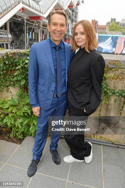 Jeff Koons and Stella McCartney pose backstage at the Stella McCartney show during Paris Fashion Week Womenswear Spring/Summer 2023 at Centre...