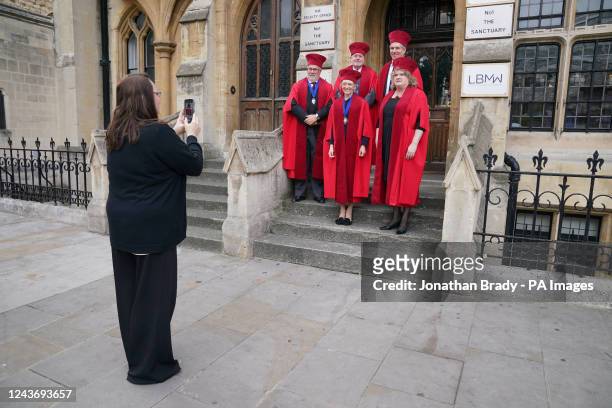 The Notaries Society of England of Wales have their photograph taken on the steps of the Faculty Office in Dean's Yard as members of the judiciary...