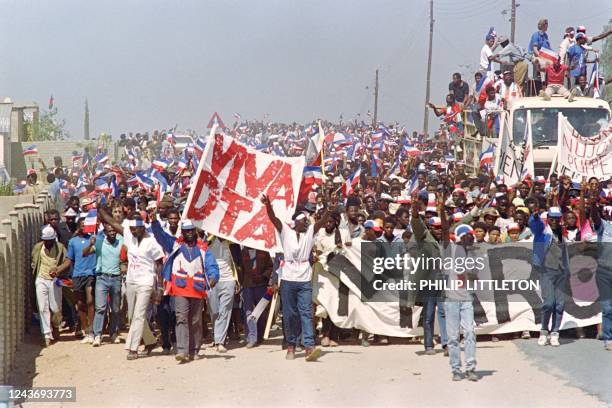 Supporters protest on August 26, 1989 in Katutura during a DTA rally for Namibia independence. In 1989, the structures resulting from the Turnhalle...