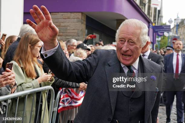 King Charles III greets members of the public as he arrives at an official council meeting at the City Chambers in Dunfermline, Fife, to formally...