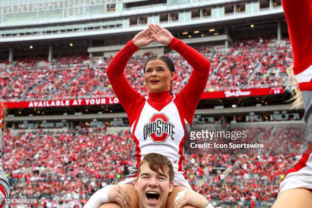 Ohio State Buckeyes cheerleaders celebrate a Buckeyes touchdown during the first half of the college football game between the Rutgers Scarlet...