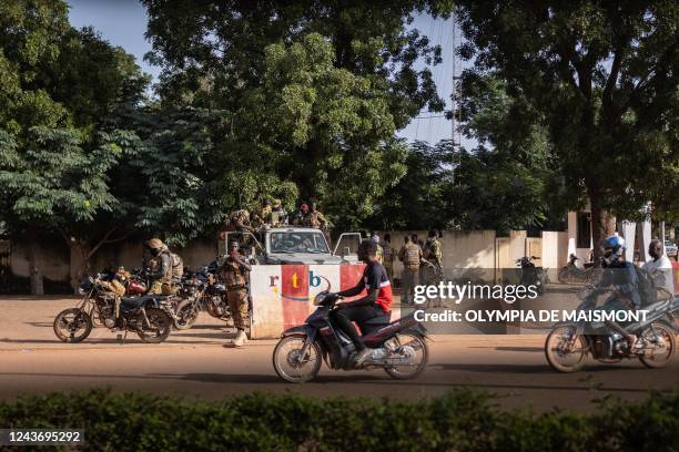 Military vehicle is seen stationed by the National Television in Ouagadougou, on October 3, 2022 - Burkina Faso's junta leader agreed to step down on...