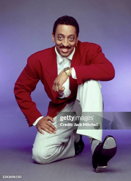 Portrait of American actor, singer, and dancer Gregory Hines as he poses in tap shoes, New York, New York, 1988.