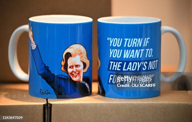 Souvenir mugs featuring an image of former British Prime Minister and Conservative party leader, Margaret Thatcher, are pictured on the second day of...