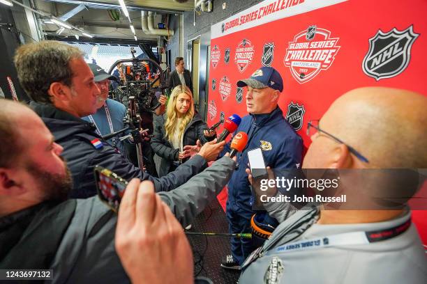 Head coach John Hynes of the Nashville Predators talks with the media following morning skate prior to the 2022 NHL Global Series Challenge...
