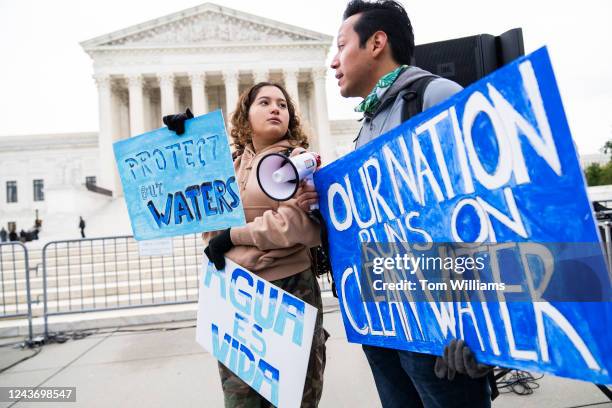 Jaime Sigaran, right, of American Rivers, and his sister Bethsaida, attend a rally to call for protection of the Clean Water Act outside of the U.S....