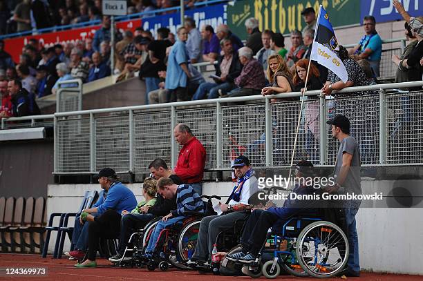 Wheelchair users sit along the pitch during the Regionalliga West match between SV Eintracht Trier 05 and FSV Mainz 05 II at Moselstadion on...