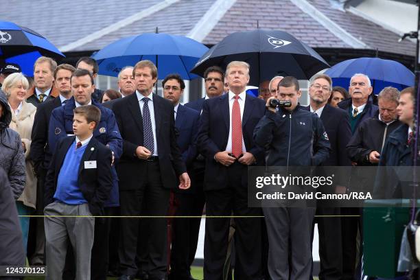 Donald Trump the American businessman with George O'Grady the Chief Executive of the European Tour during the Opening Ceremony for the 2011 Walker...