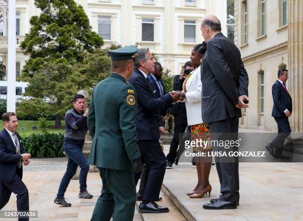 Secretary of State Antony Blinken is greeted by Colombian Vice President Francia Marquez at the Presidential palace in Bogota on October 3, 2022. -...