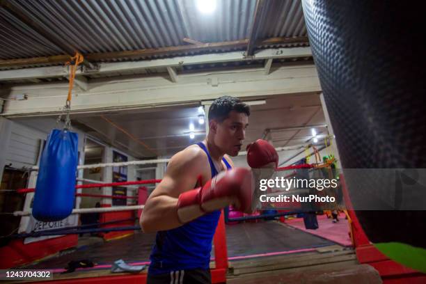 Santiago, Chile. October 3, 2022. Young amateur boxers train at the school of former professional boxer Carlos &quot;Látigo&quot; Uribe in Osorno on...