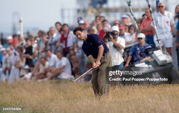 David Feherty of Northern Ireland plays out of the rough during the 118th Open Championship at Royal Troon Golf Club in Troon, Scotland, circa July...