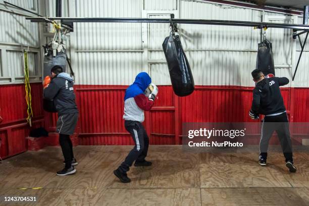 Santiago, Chile. October 3, 2022. Young amateur boxers train at the school of former professional boxer Carlos &quot;Látigo&quot; Uribe in Osorno on...