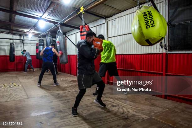 Santiago, Chile. October 3, 2022. Young amateur boxers train at the school of former professional boxer Carlos &quot;Látigo&quot; Uribe in Osorno on...
